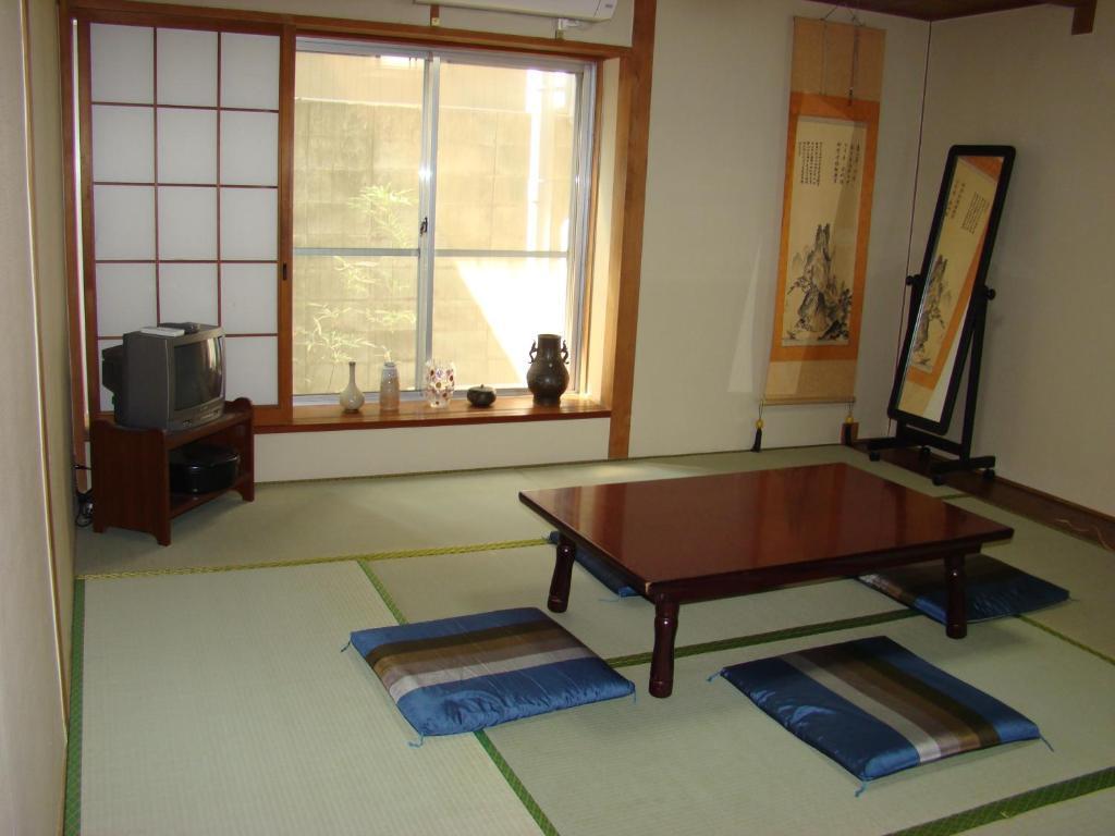 Hotel Yamabe Tenri Habitación foto
